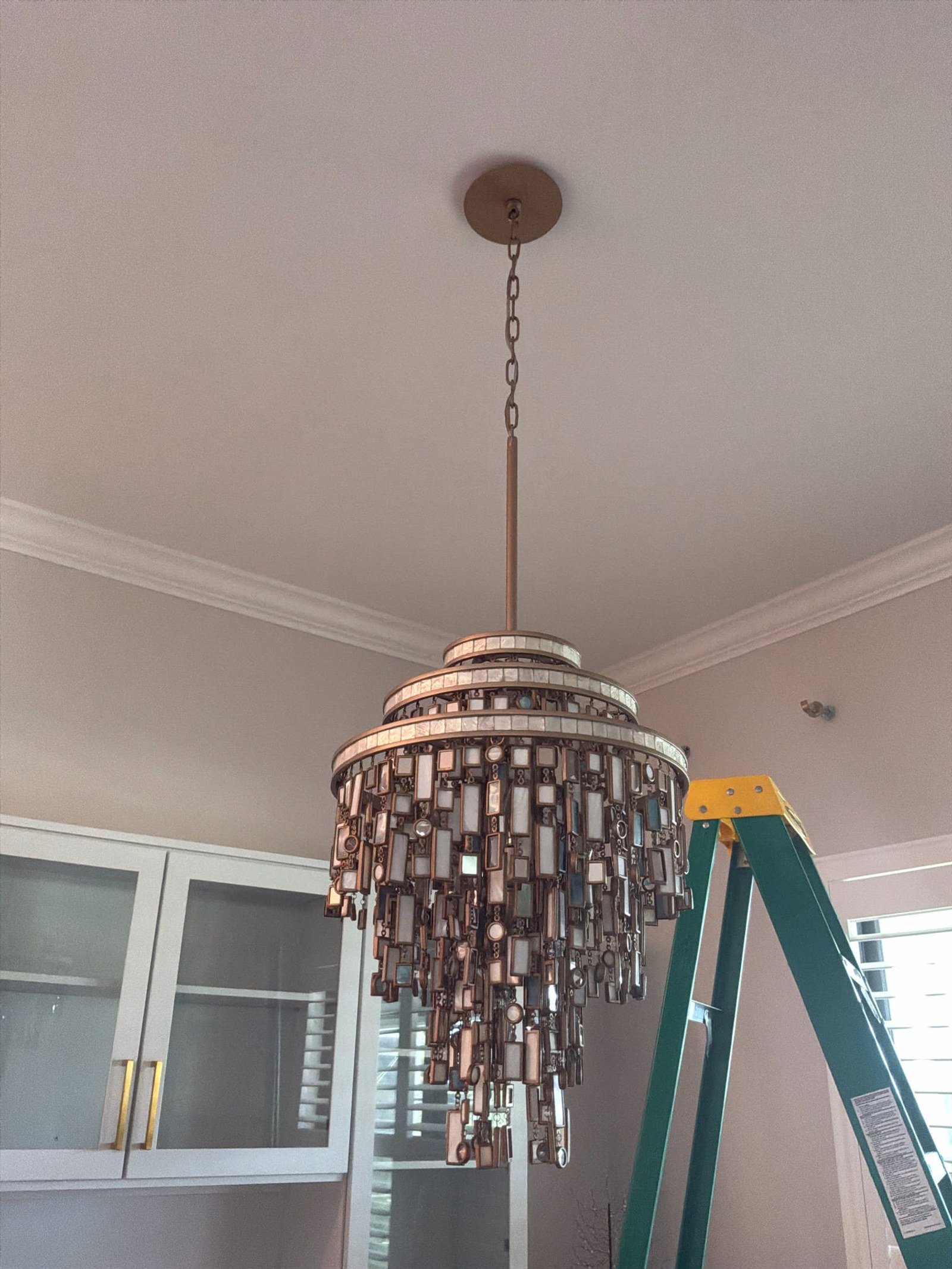 Safe Chandelier Removal in This Venice Home